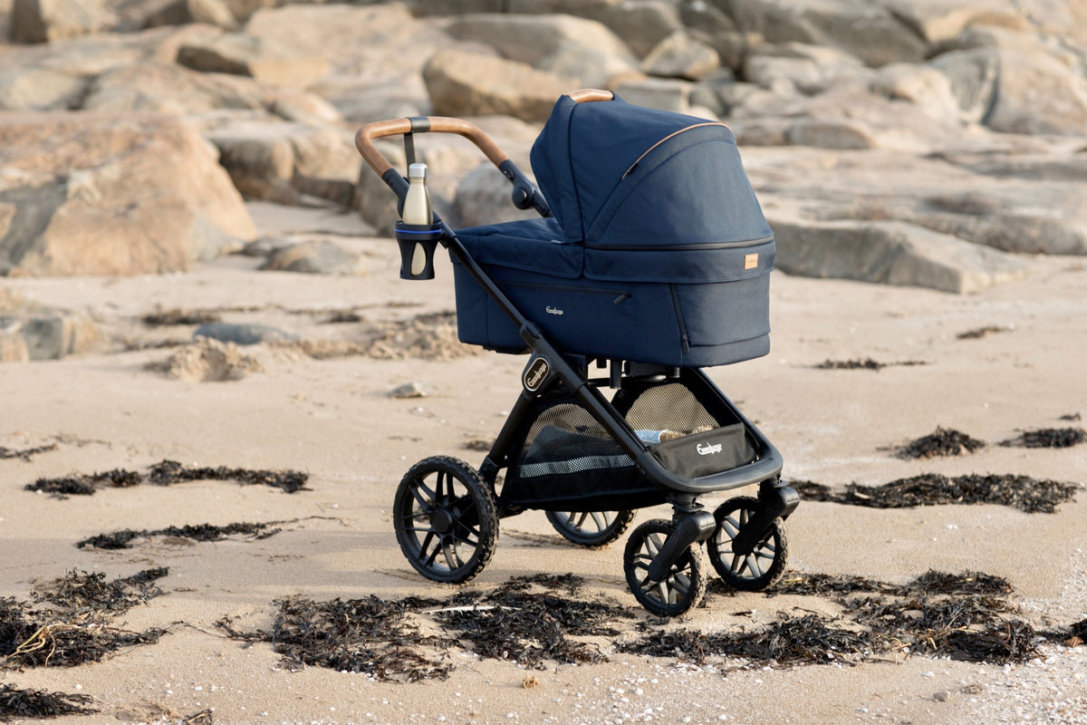 Cupholder XL with a bottle on an Emmaljunga stroller